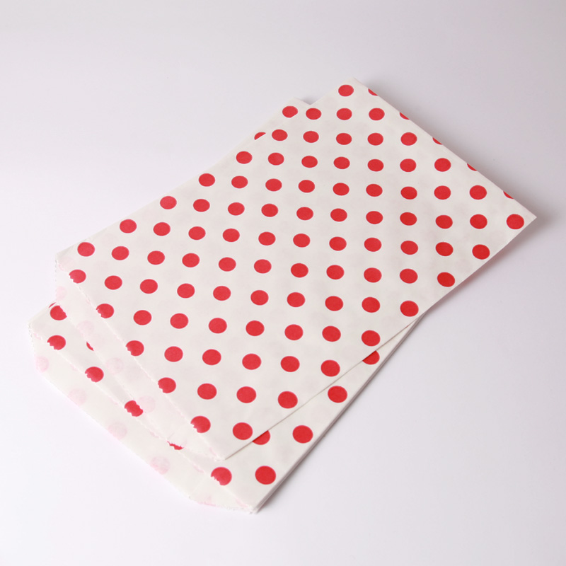 8 red polka dot paper party bags