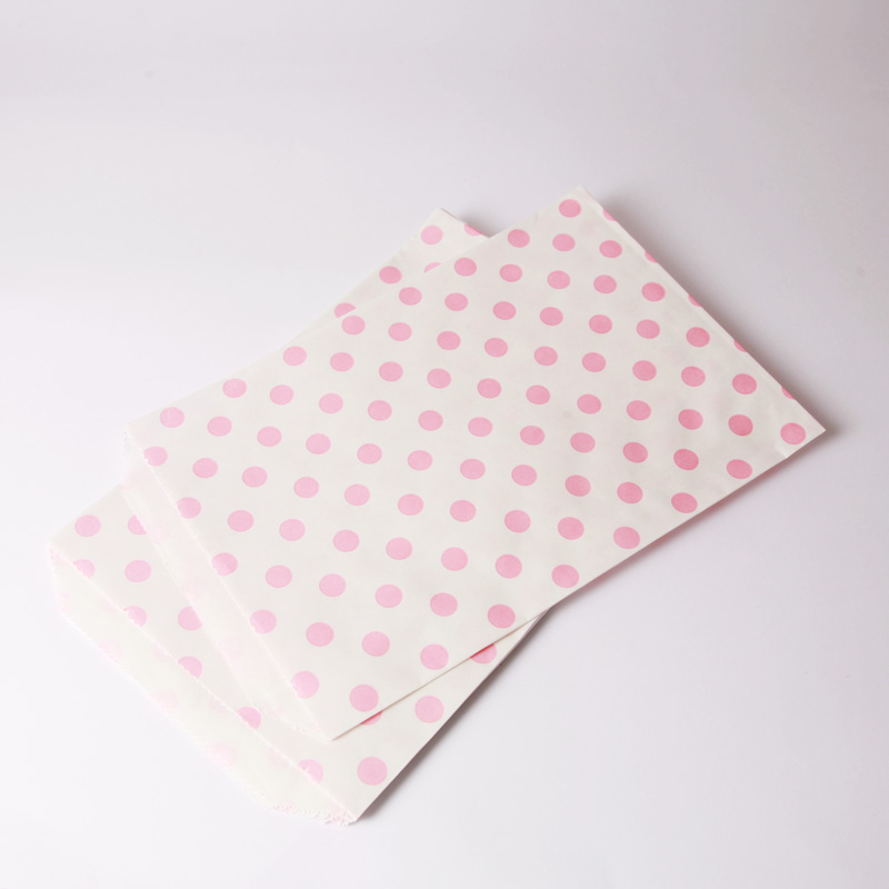 8 pink polka dot paper party bags