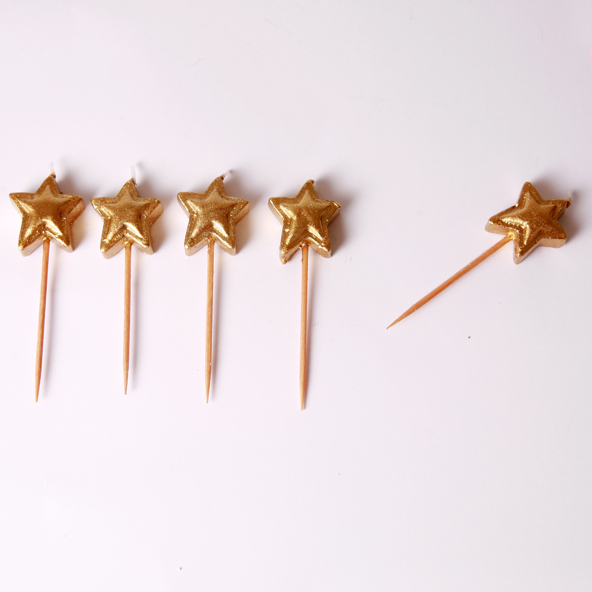 5 Gold star candles