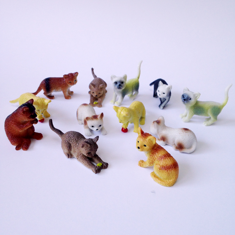 set of 12 toy cats