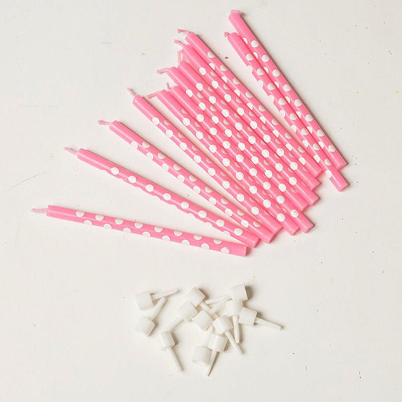 10 Pink candles with white polka dots