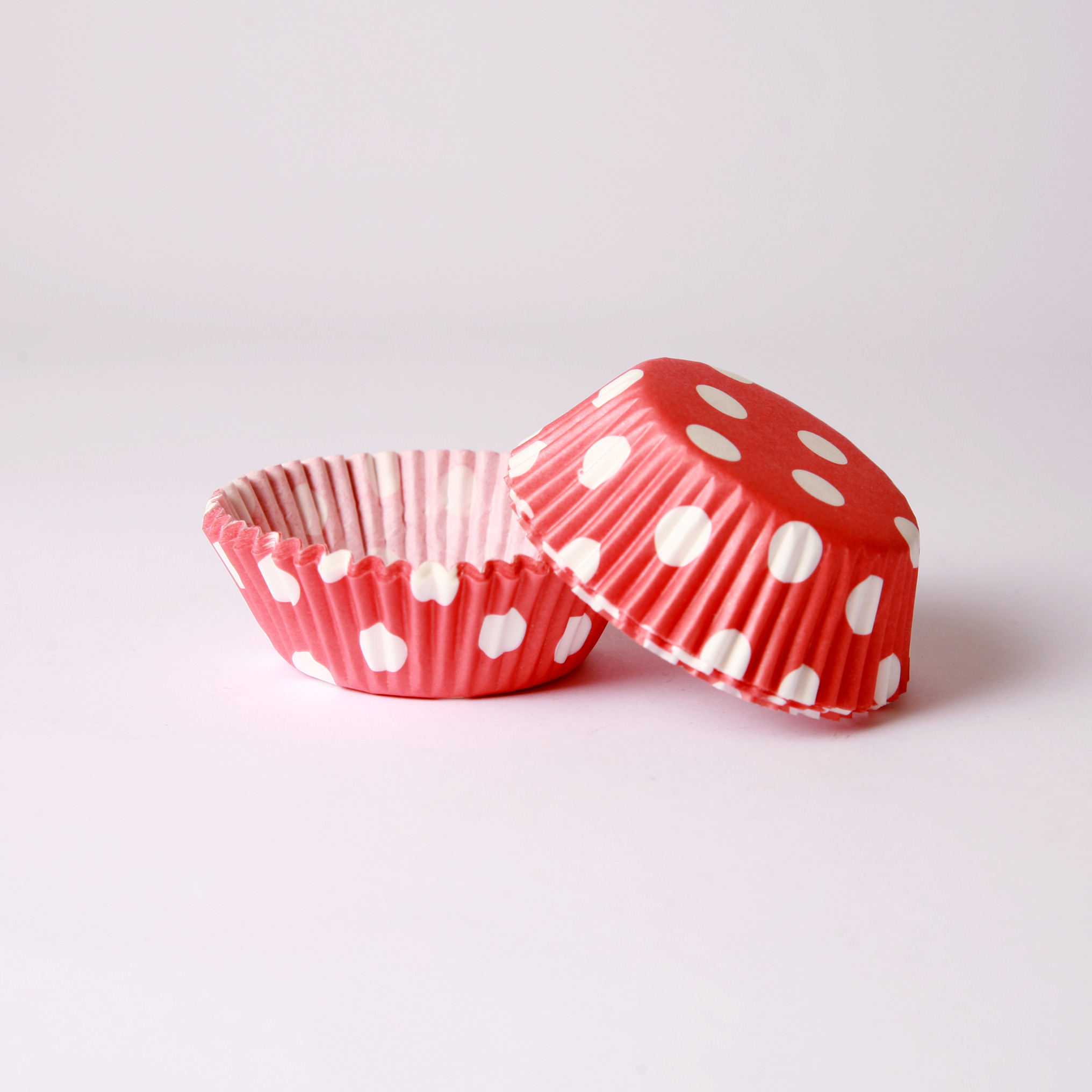 Red polka dot cupcake cases